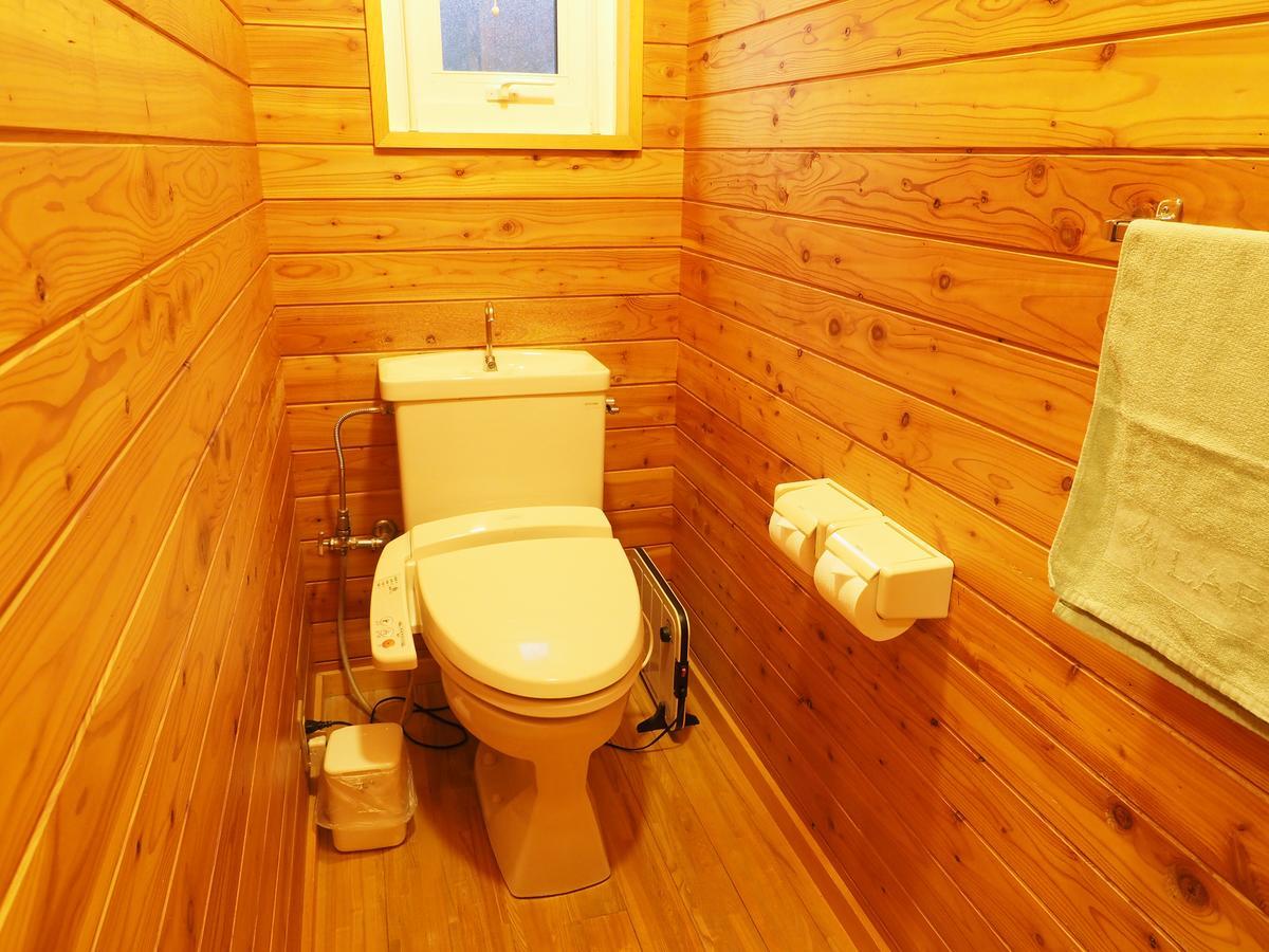 Log Hotel Larch Lake Kanayama Minamifurano Rom bilde