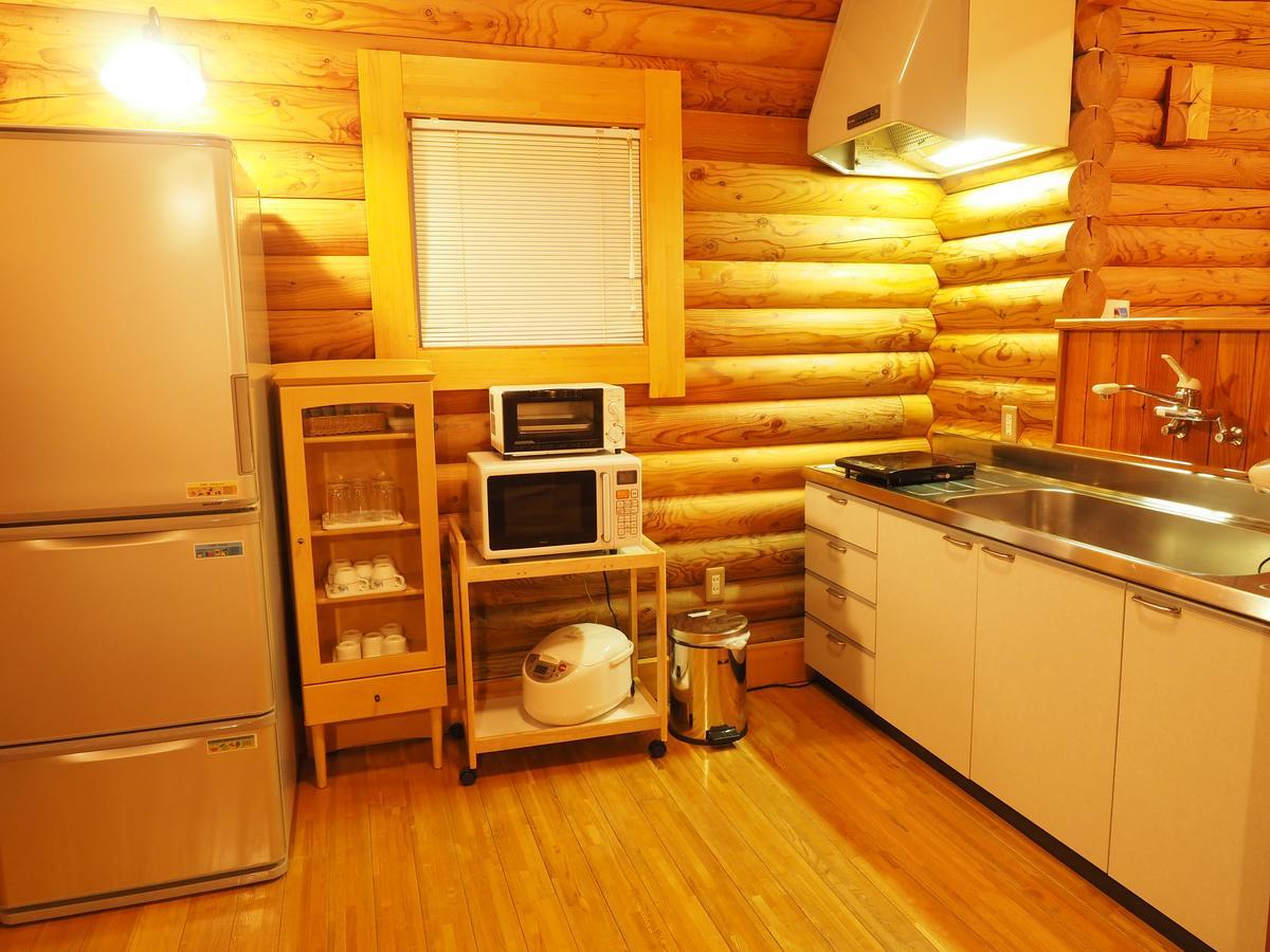 Log Hotel Larch Lake Kanayama Minamifurano Rom bilde