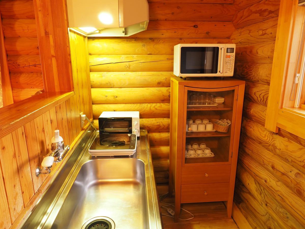 Log Hotel Larch Lake Kanayama Minamifurano Rom bilde