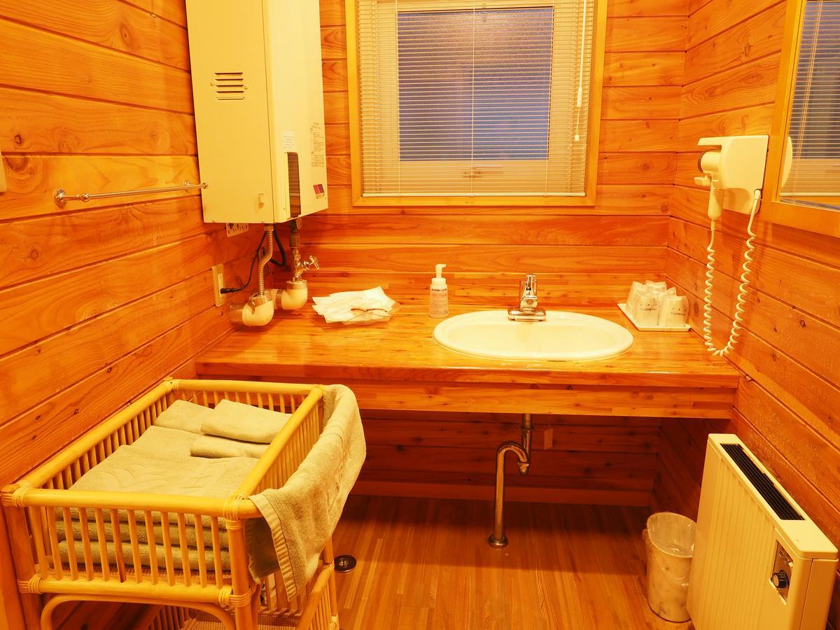 Log Hotel Larch Lake Kanayama Minamifurano Rom bilde