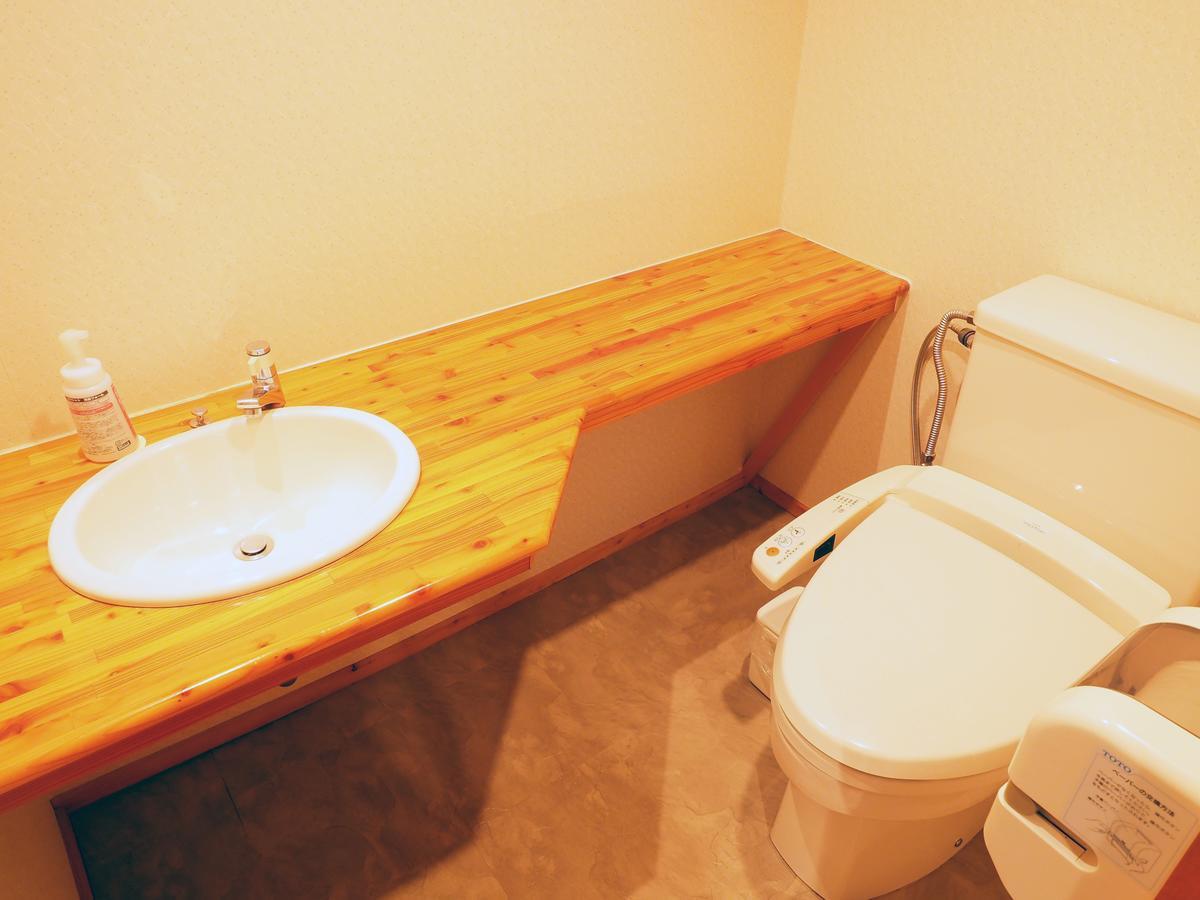 Log Hotel Larch Lake Kanayama Minamifurano Rom bilde