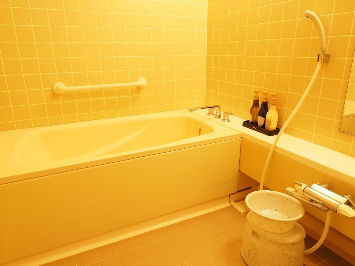 Log Hotel Larch Lake Kanayama Minamifurano Rom bilde